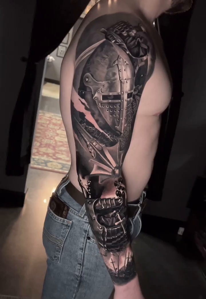 Knight's armor and sword realism tattoo by Travis Chick