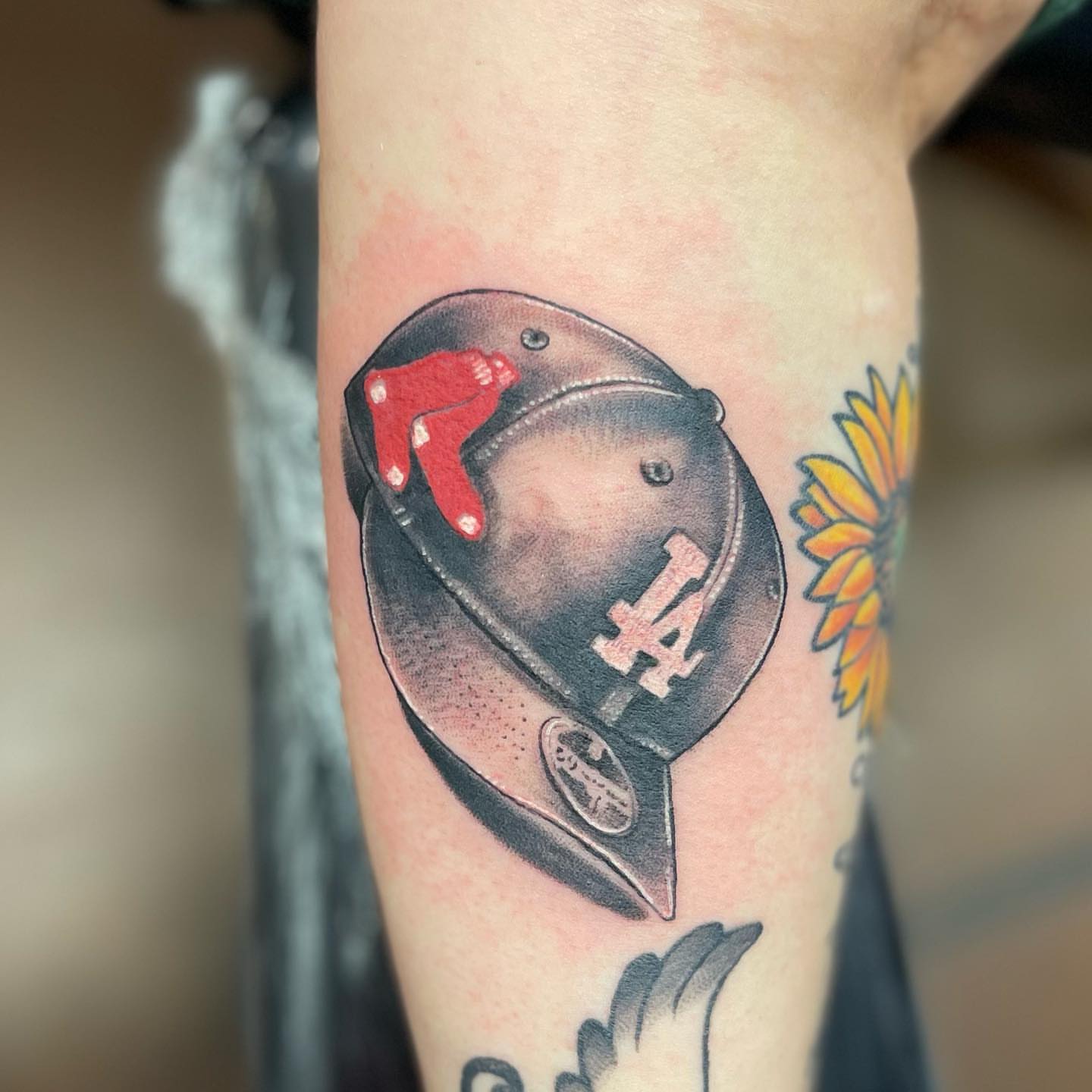 Football helmet realism tattoo on the forearm by 💀good To the Grave💀