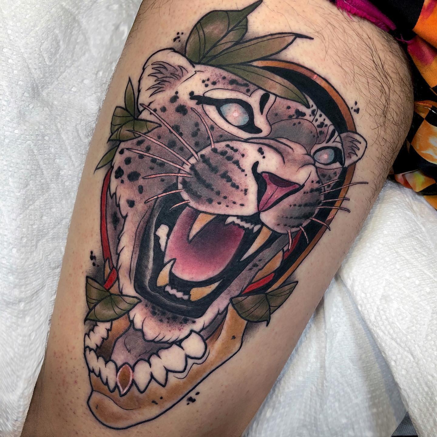Roaring leopard realism tattoo on the thigh by 🍃  𝑳𝒆𝒆 𝑴𝒖𝒍𝒍𝒆𝒏  🍂, Seattle, Washington