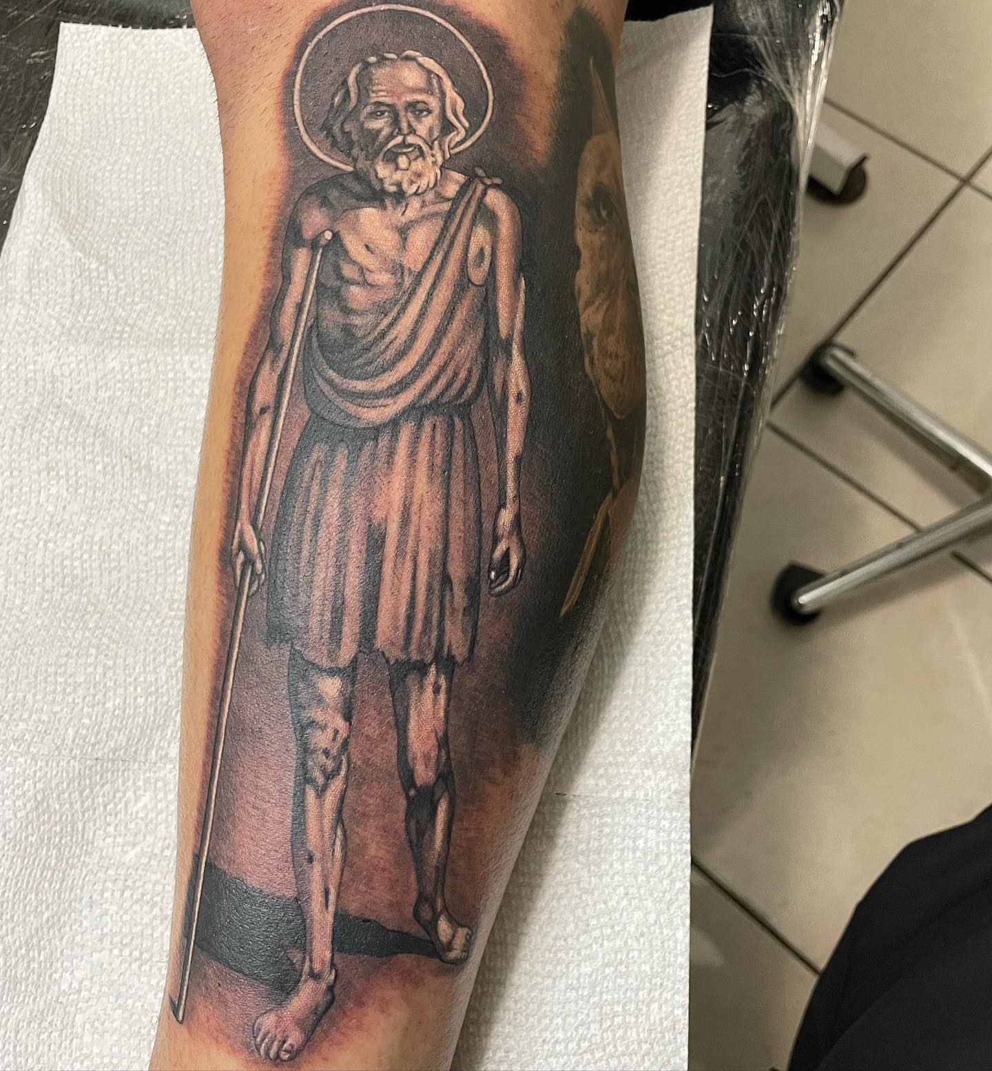 Religious figure realism tattoo on the forearm by payaso