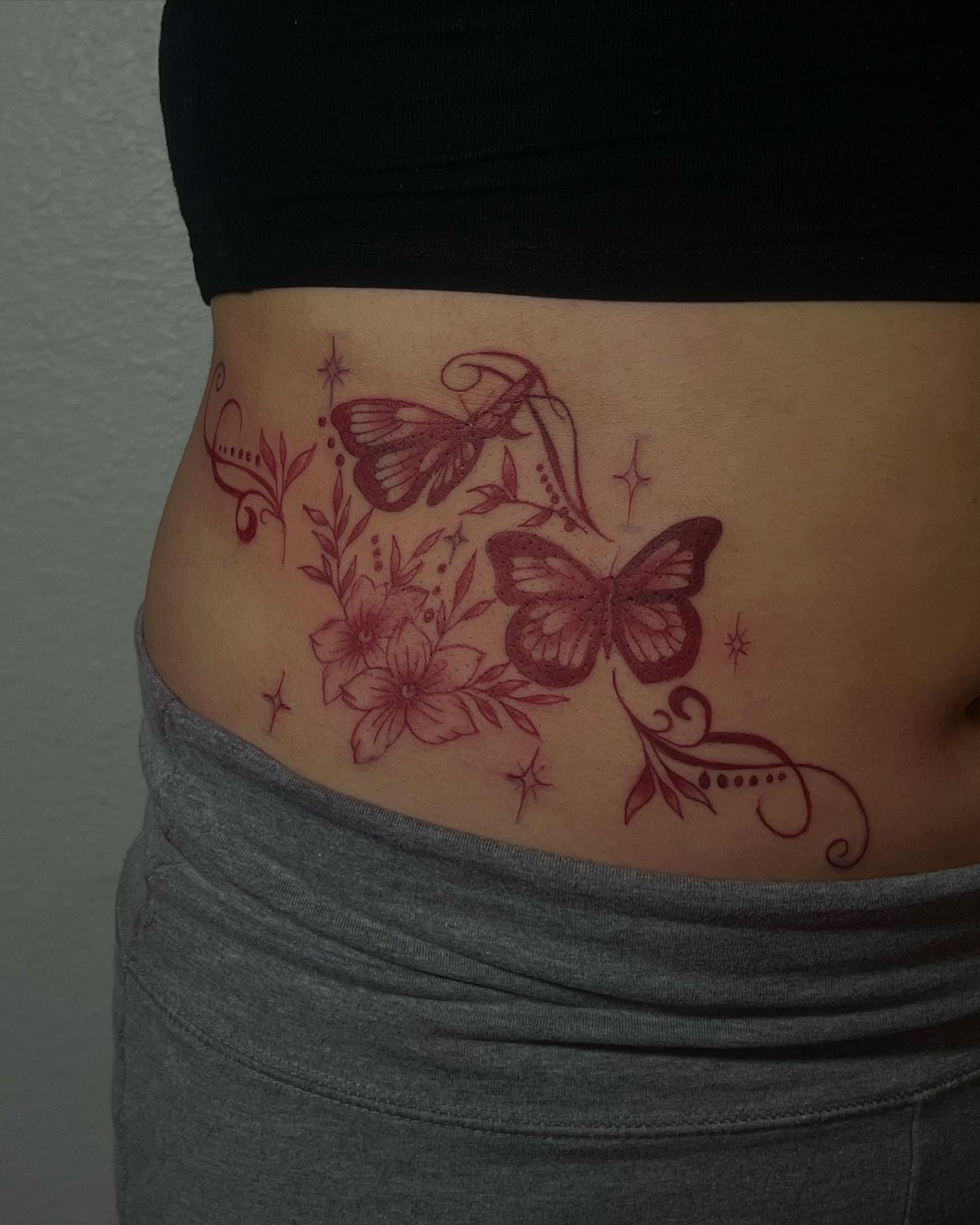 Butterflies and flowers new school tattoo on the torso by josselyn ☪︎
