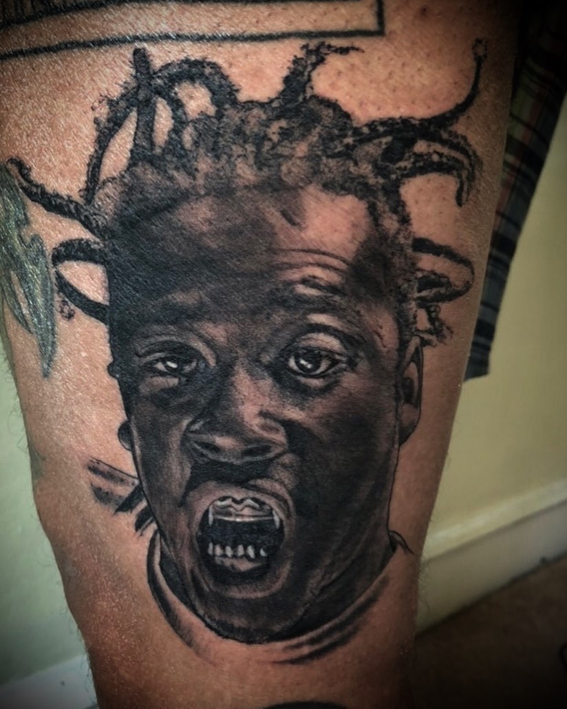 Portrait of a person realism tattoo on the forearm by Bobby Trefz
