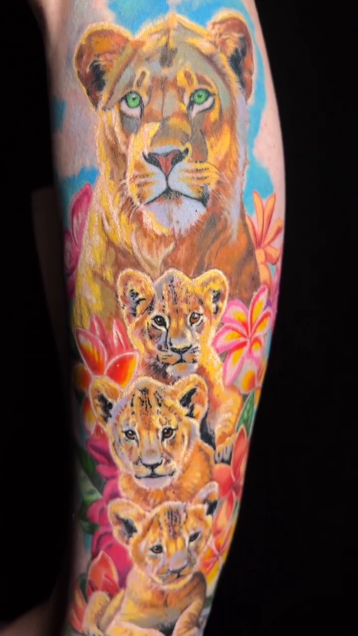 Lioness and cubs realism tattoo by Jamie Lee Parker