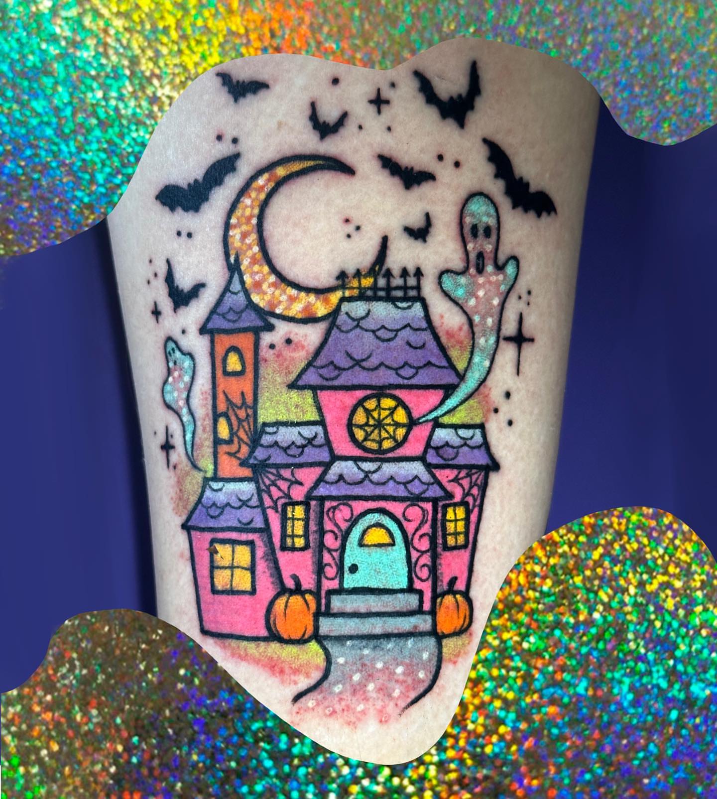 Haunted house new school tattoo on the forearm by Chelsea Lane
