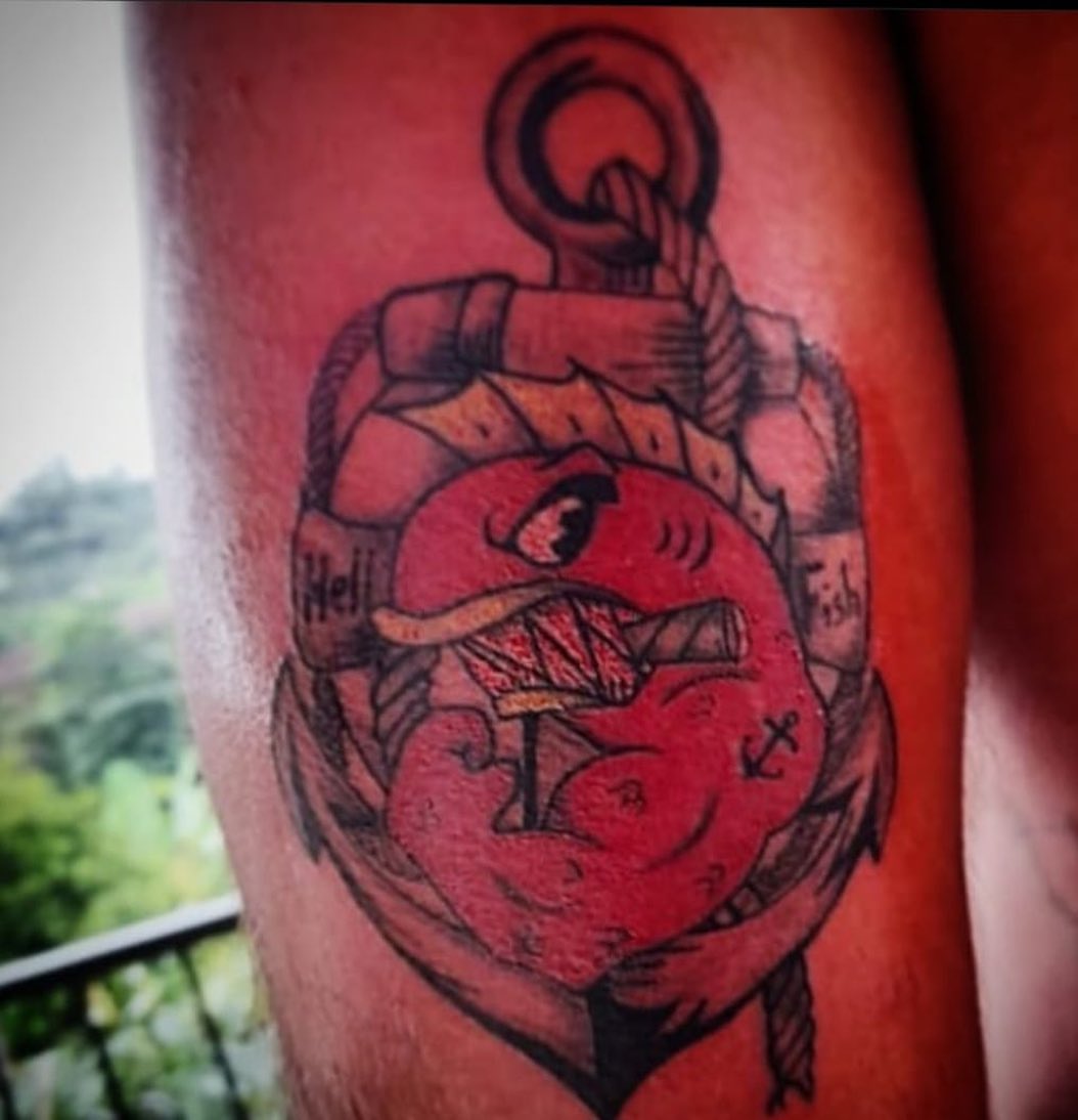 Heart with anchor American traditional tattoo on the forearm by Erasmo Vasquez