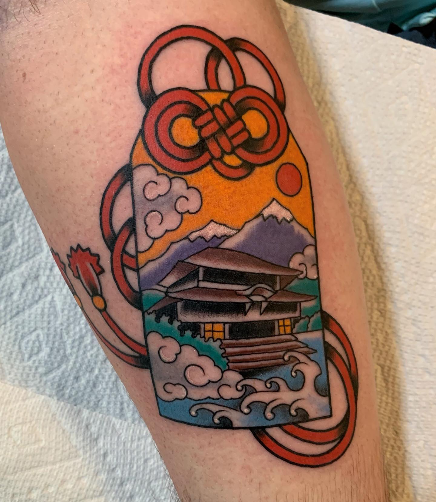 Japanese temple American traditional tattoo on the thigh by Ethan Bennett
