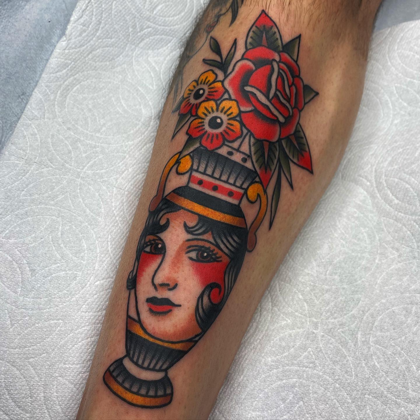 Woman's head American traditional tattoo on the forearm by andrewtattoos