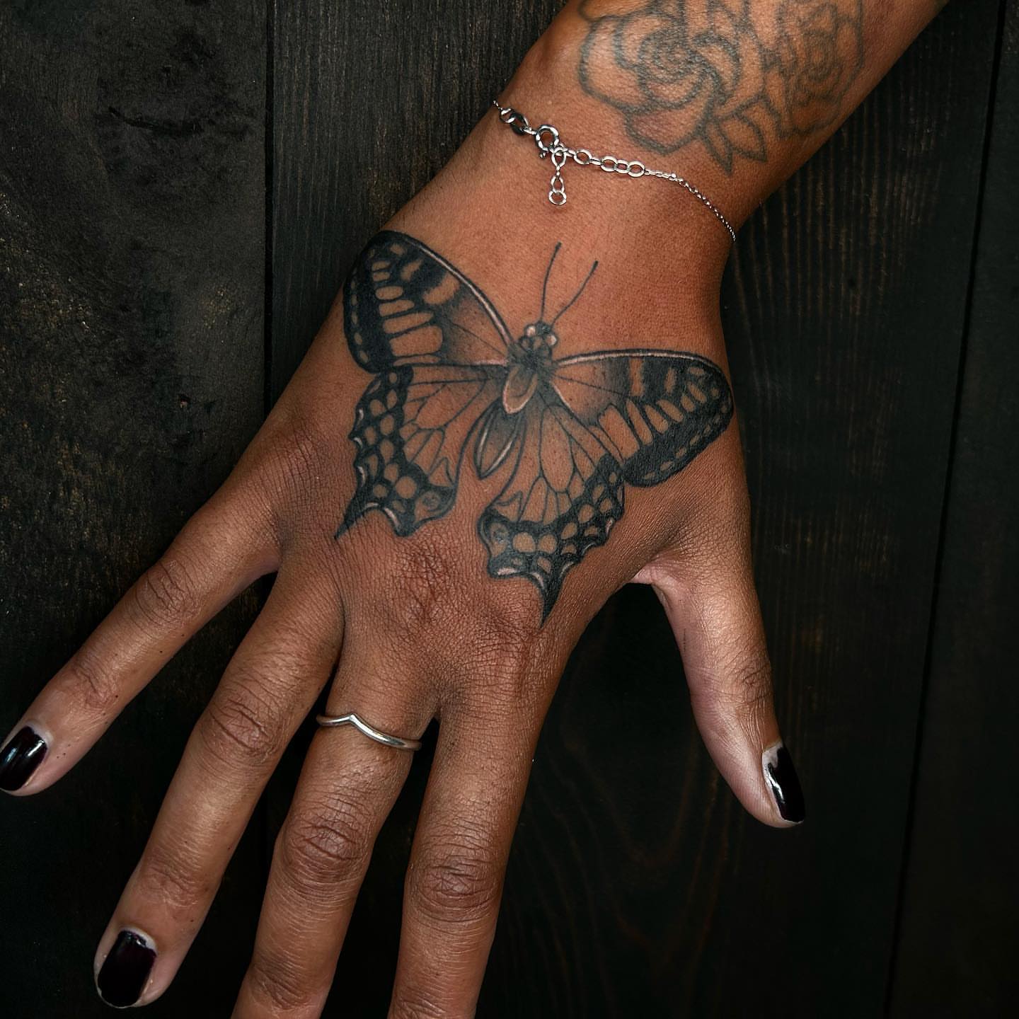 Butterfly black and grey tattoo on the hand by ♡︎ Kaylie ♡︎, Tacoma, Washington