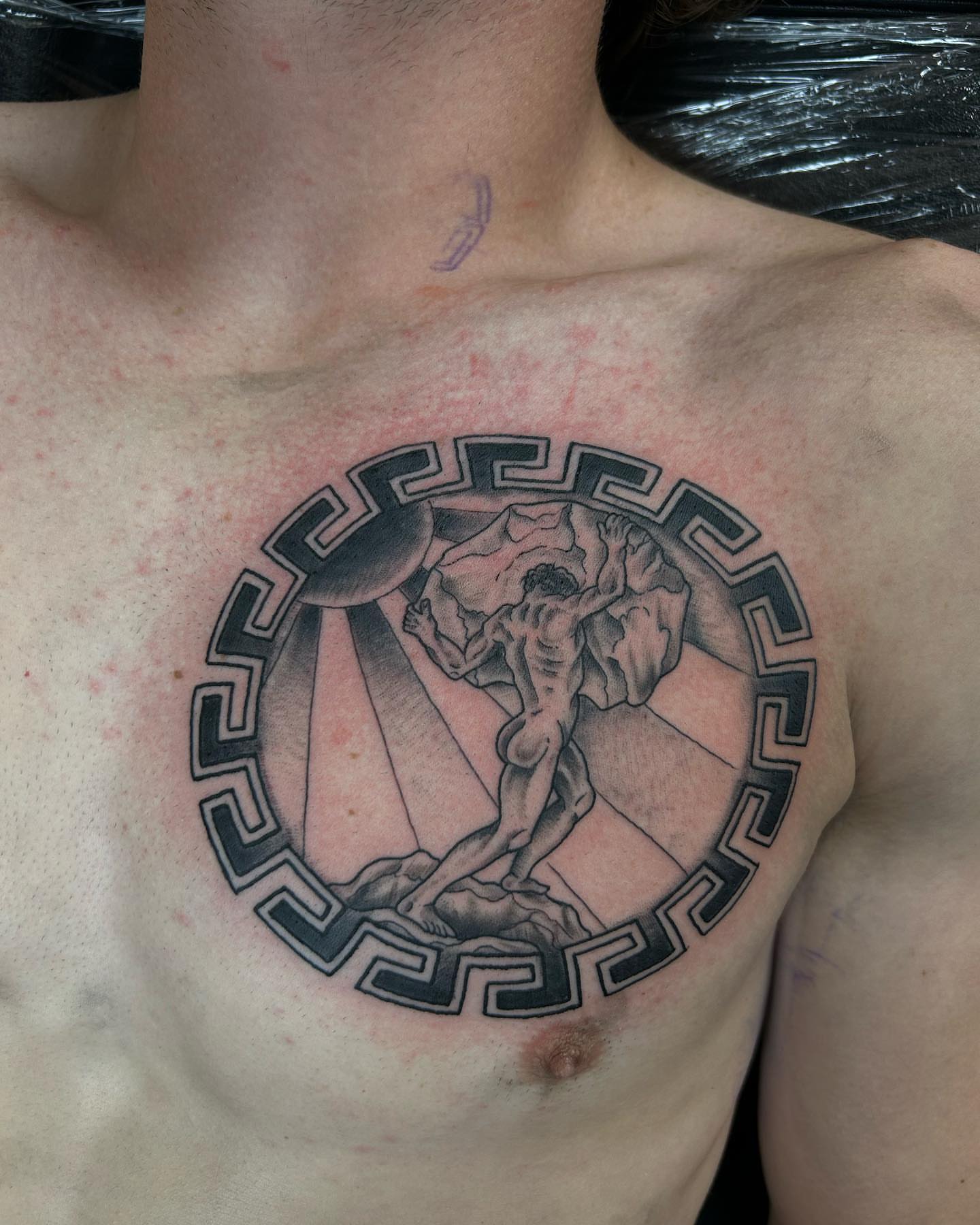 The pieta realism tattoo on the chest by Ares Rhodes