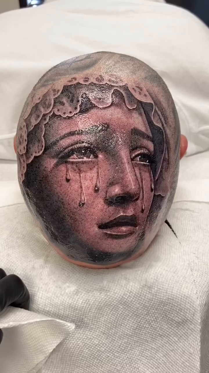 Weeping woman's face realism tattoo by Joshua ramirez, Montebello, California