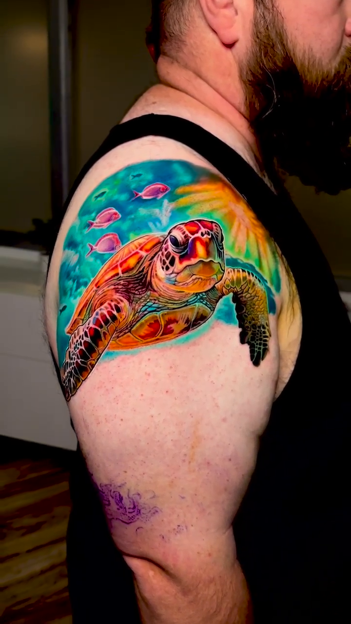 Sea turtle swimming realism tattoo by Bobby Cupparo