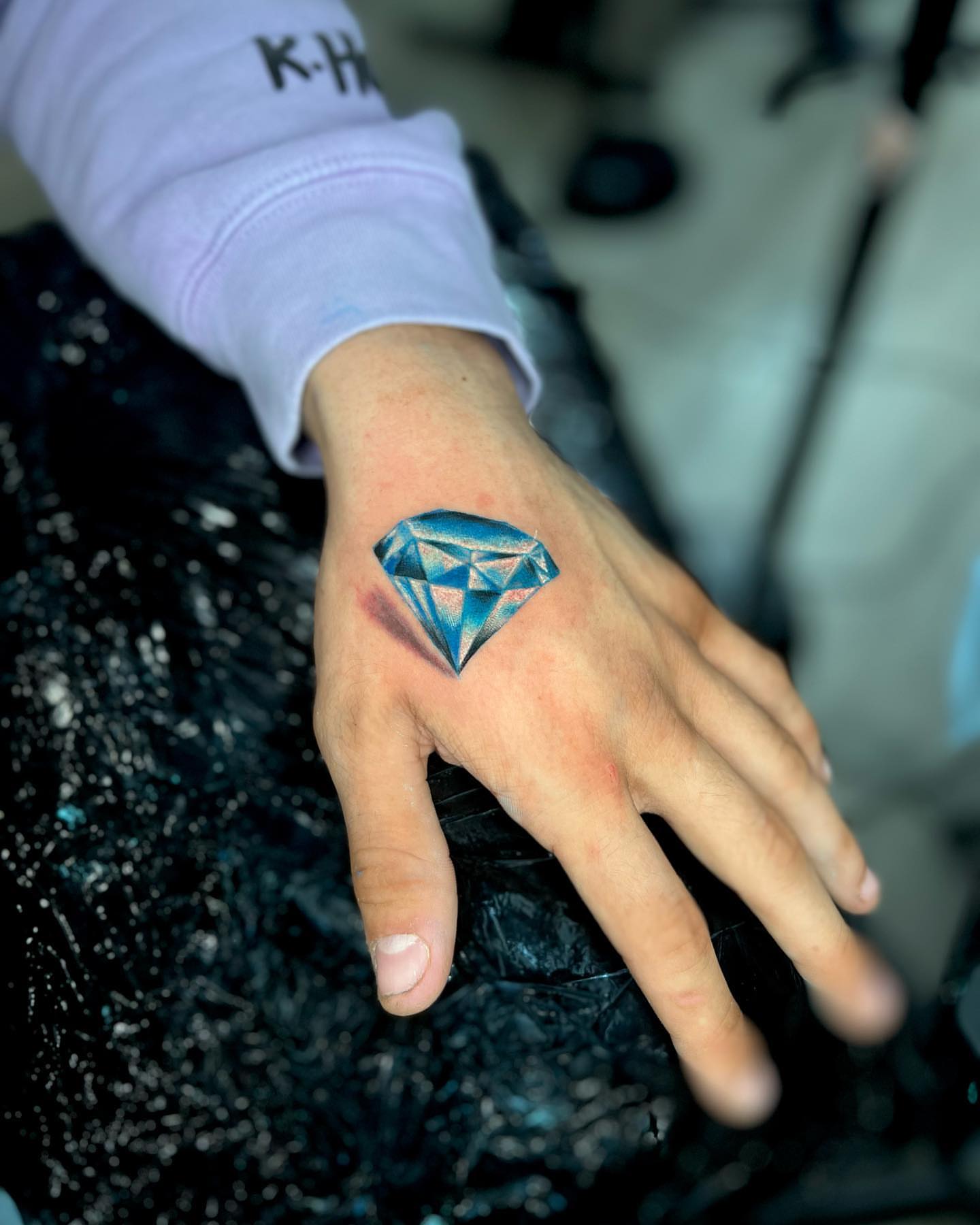 Diamond geometric tattoo on the hand by Alfonso Duenas