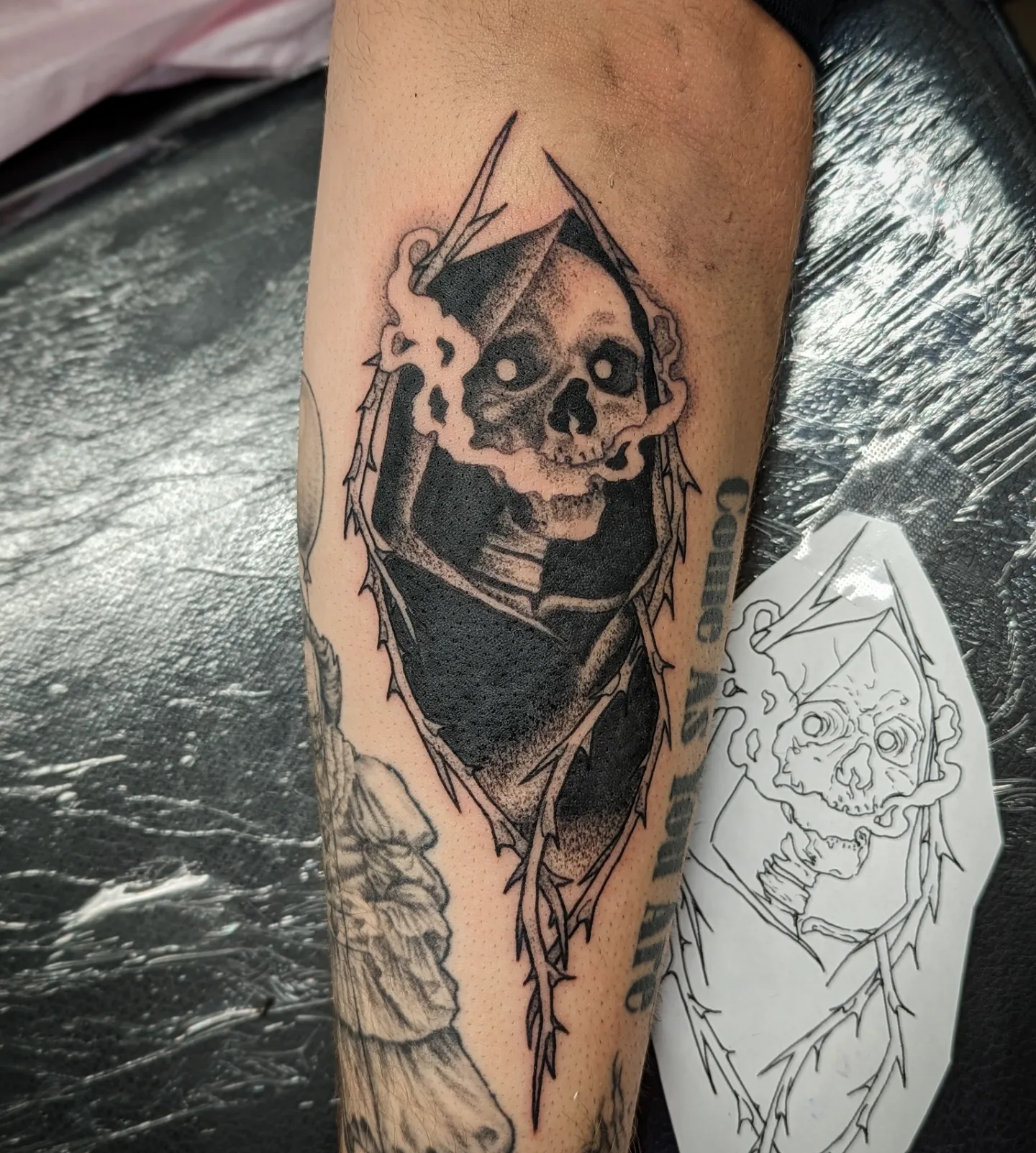 Reaper skull dotwork tattoo on the forearm by Lorelei