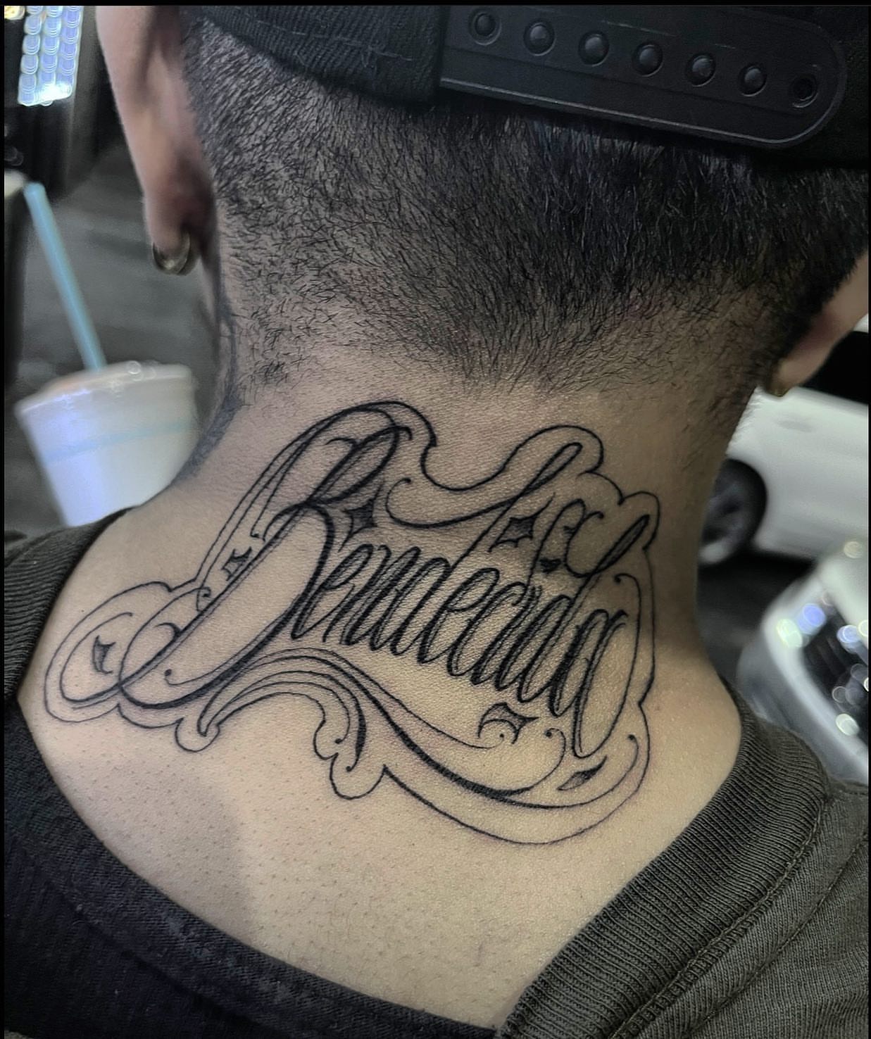 Script lettering lettering script tattoo on the neck by Las Vegas Tattoo Artist