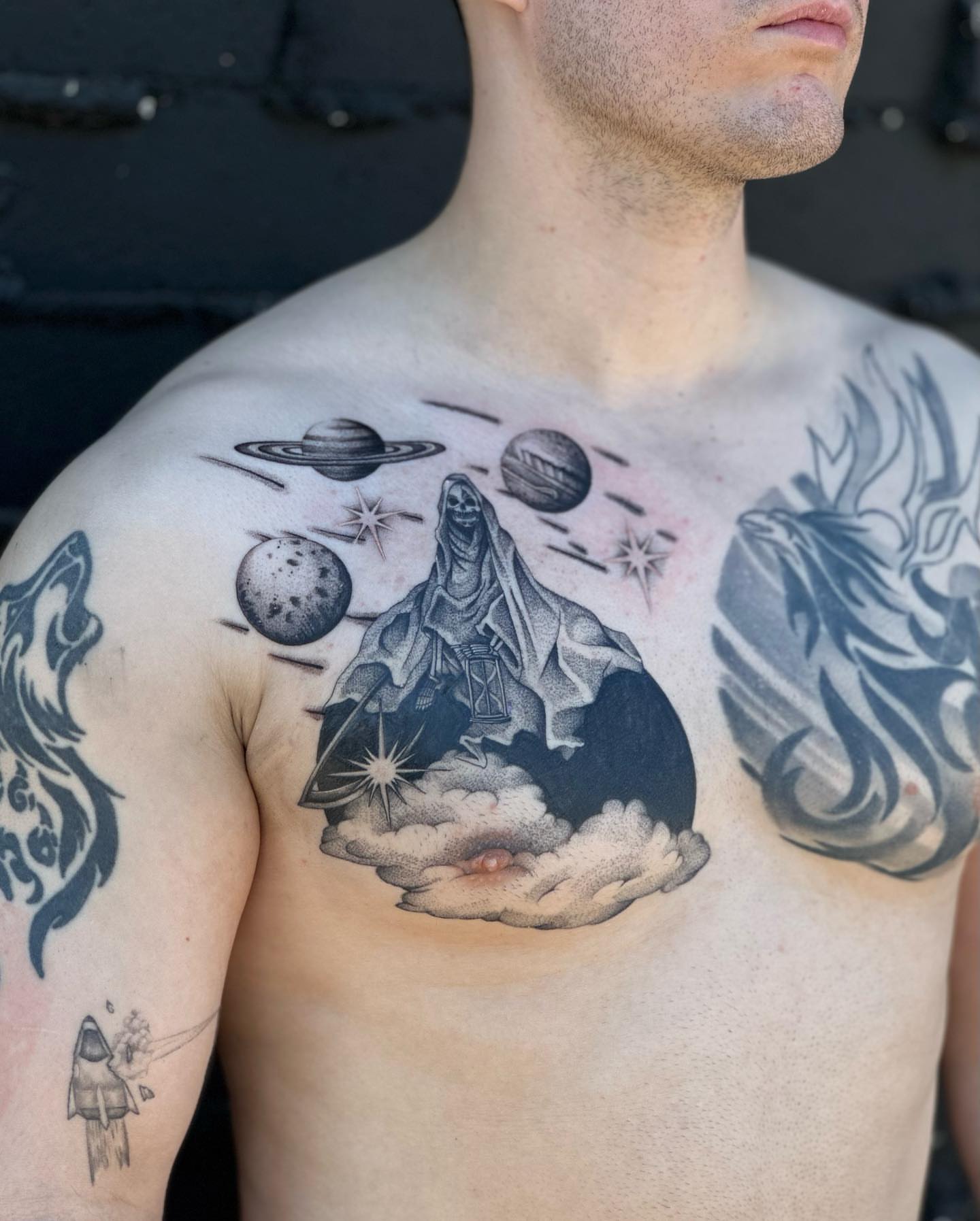 Astronaut in space dotwork tattoo on the chest by Fine line tattoo San Diego, San Diego, California