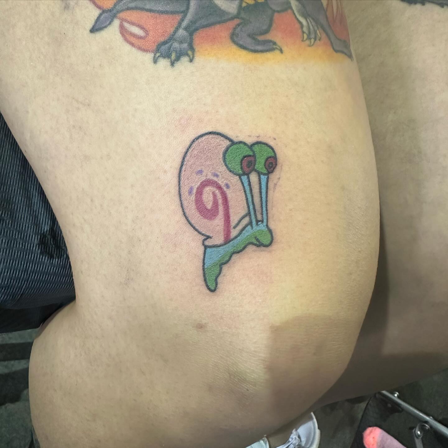 Squidward new school tattoo on the thigh by Cyko Hernandez