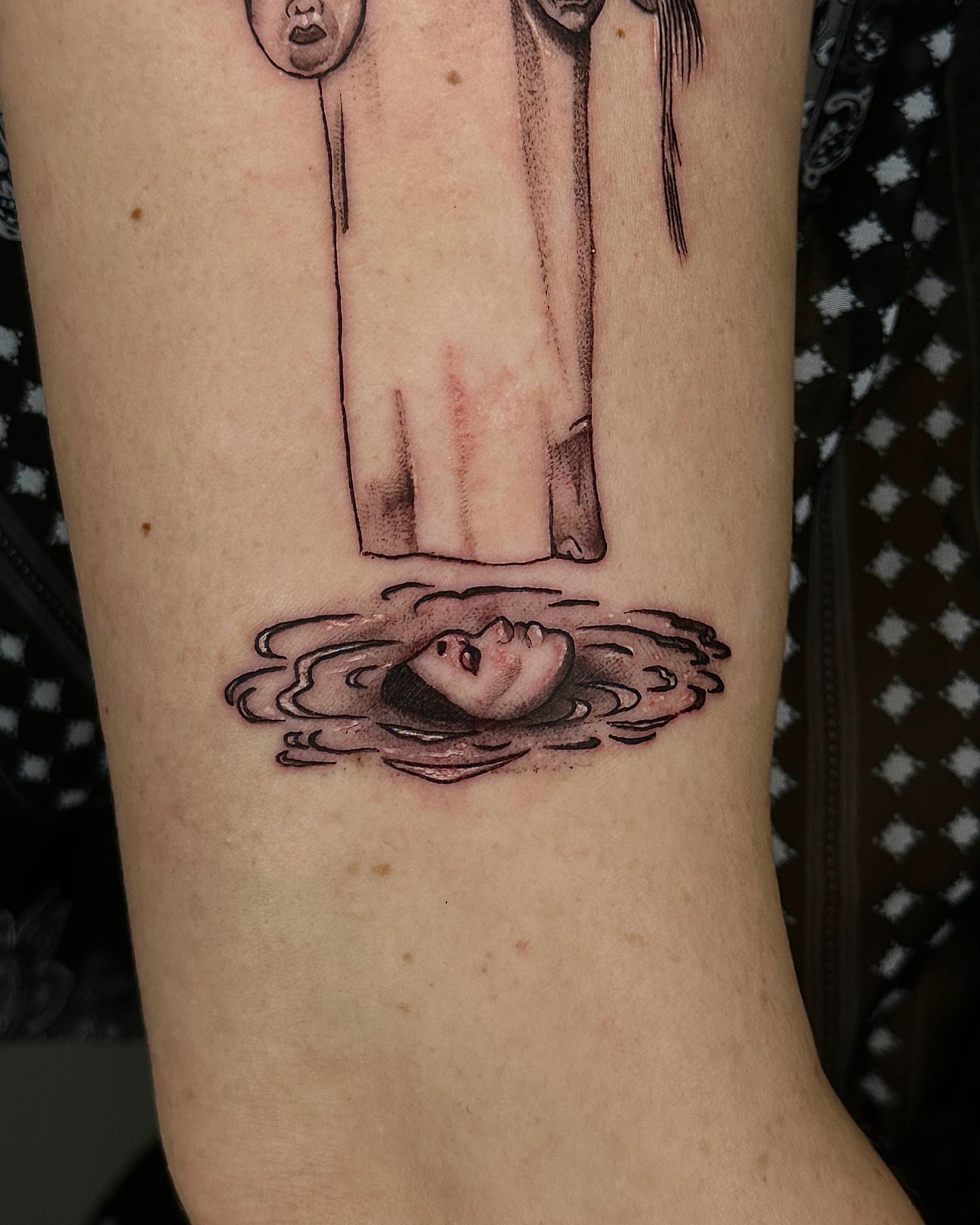 Drowning figure realism tattoo on the forearm by A L e X