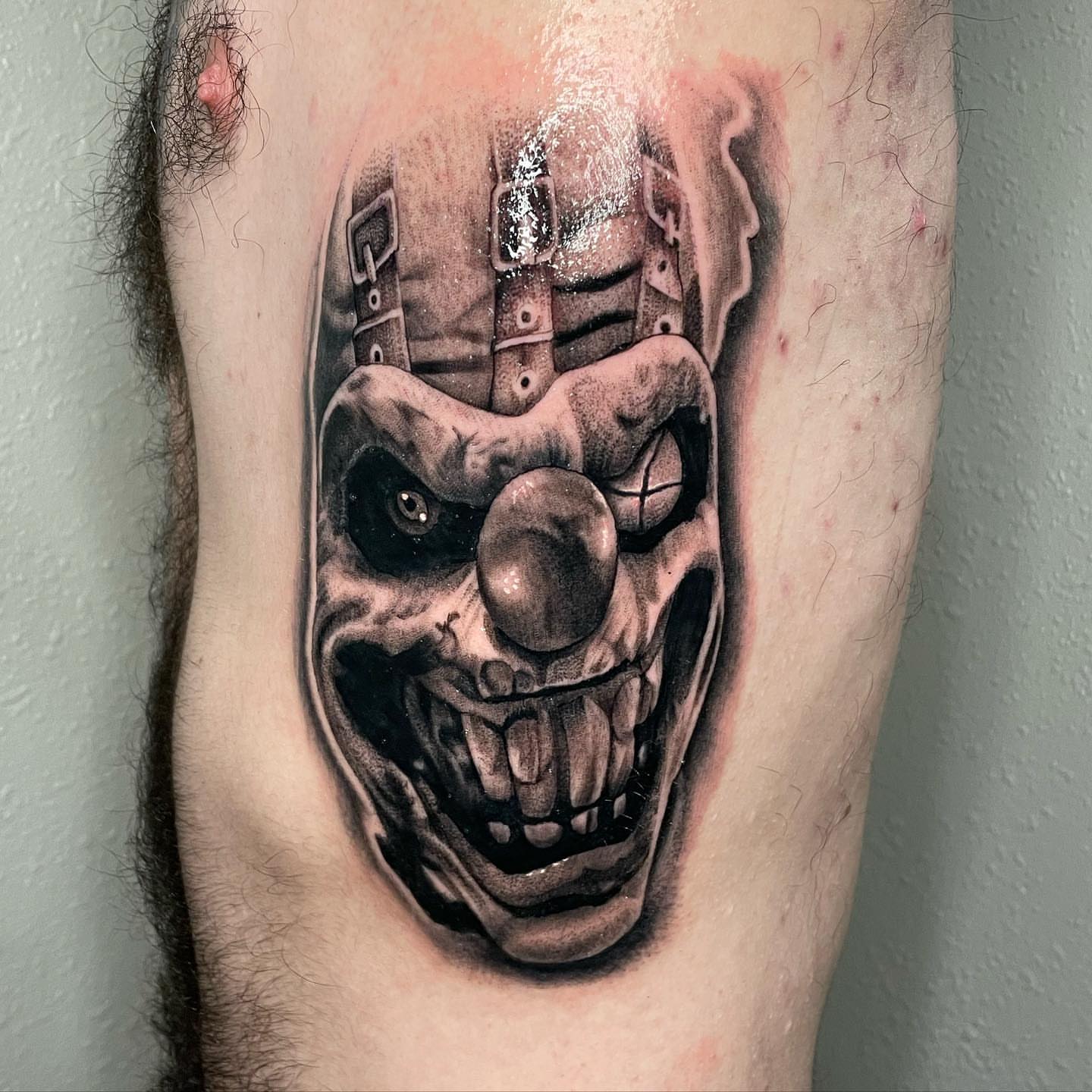 Clown face realism tattoo on the forearm by Fullerton ca tattooing