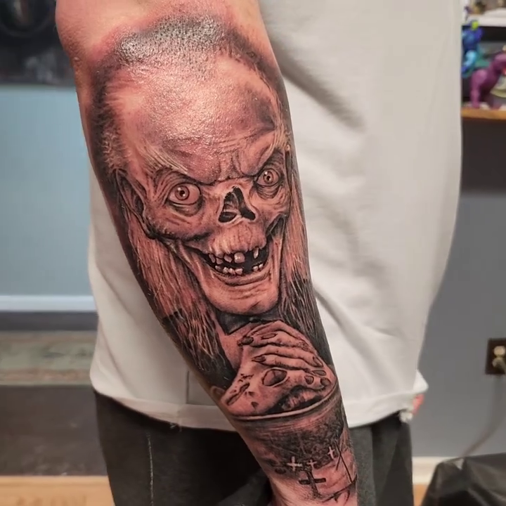 Creepy skull figure realism tattoo by Don Taylor