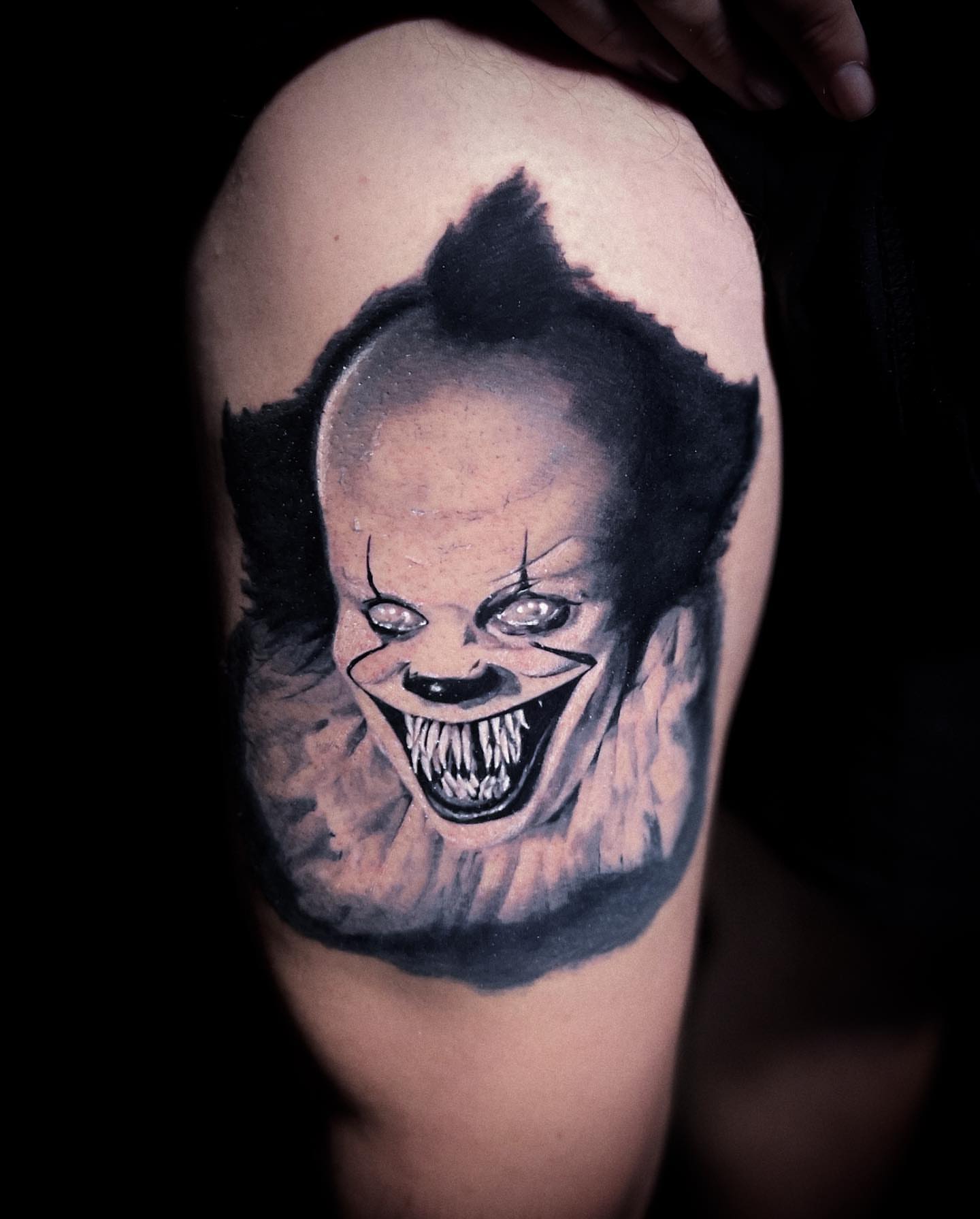 Clown realism tattoo on the thigh by Joe Beasley