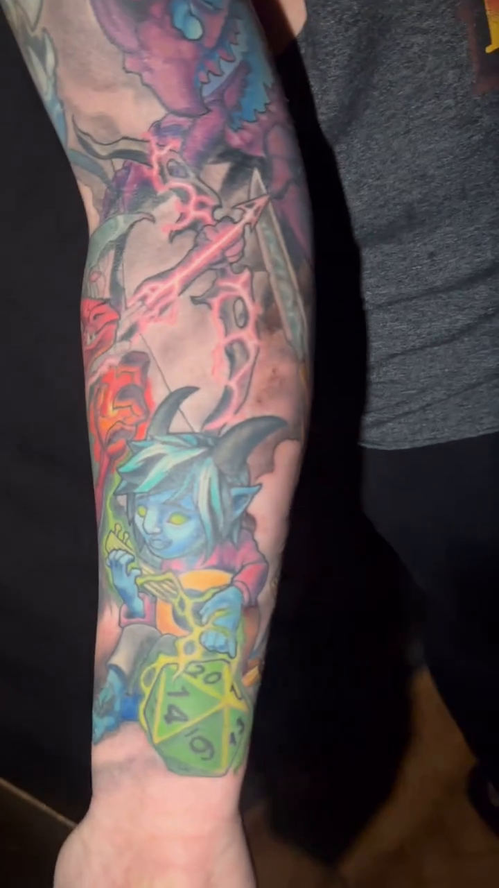 Fantasy creatures and dice new school tattoo by shane baker