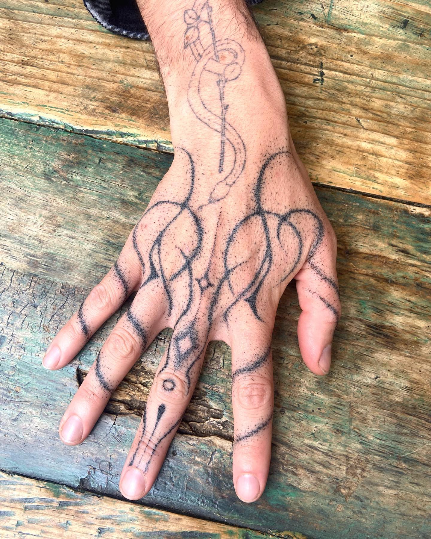 Abstract design black and grey tattoo on the hand by ∘≁≀Gæish∀ ⍕ ◯⊂ⅇl⌾tl≀≁∘