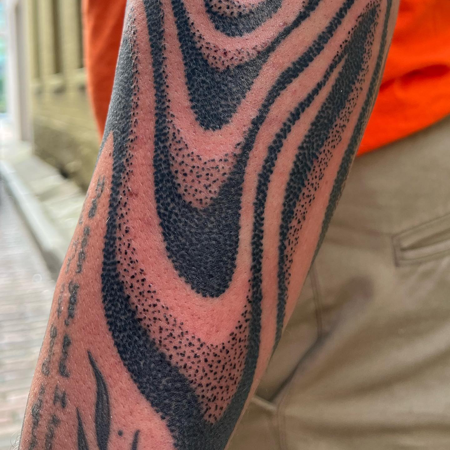 Abstract pattern dotwork tattoo on the forearm by kevvy