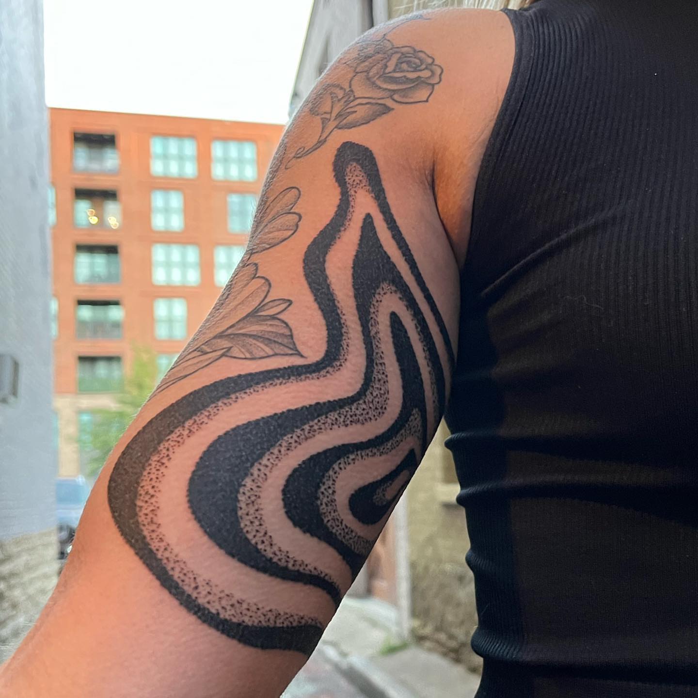 Swirls and rose dotwork tattoo on the forearm by kevvy