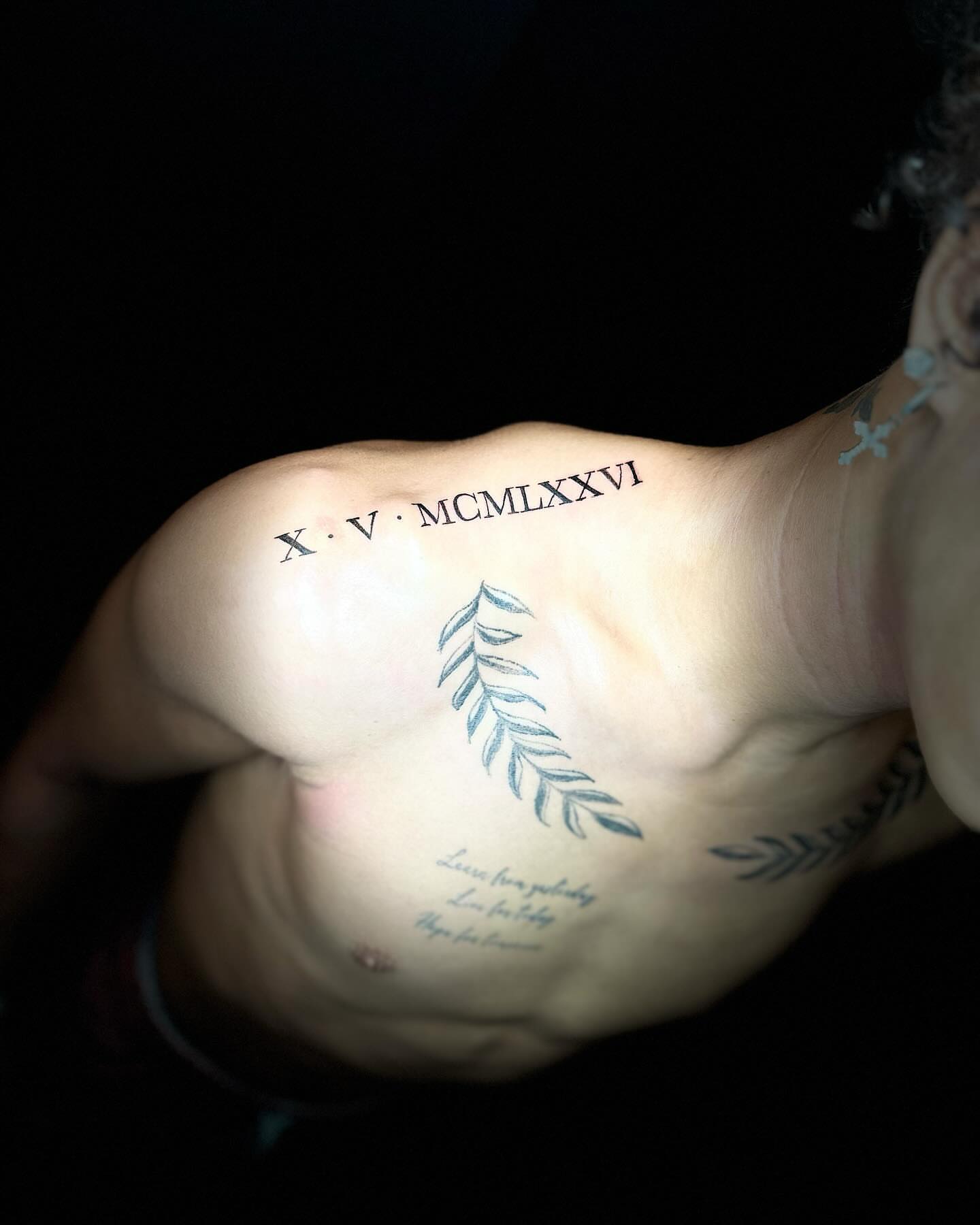 Leaf fine line tattoo on the chest by @getmoneetattz