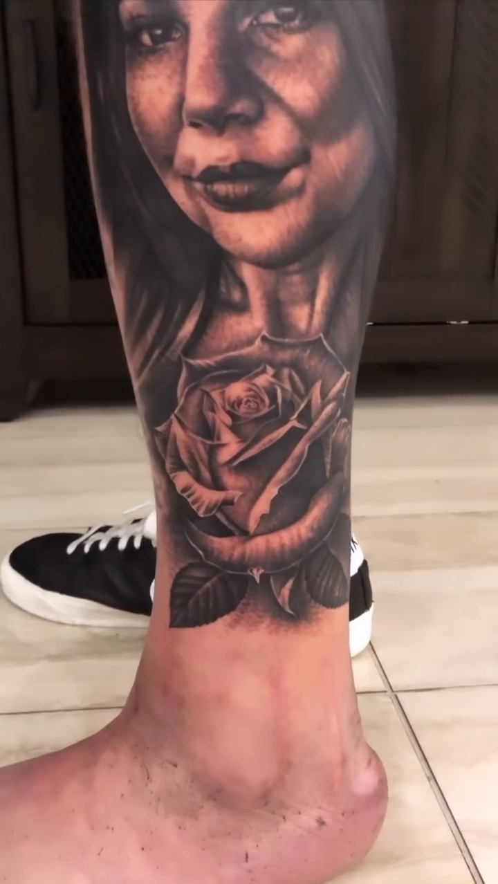 Woman and rose realism tattoo by Danny Rodriguez