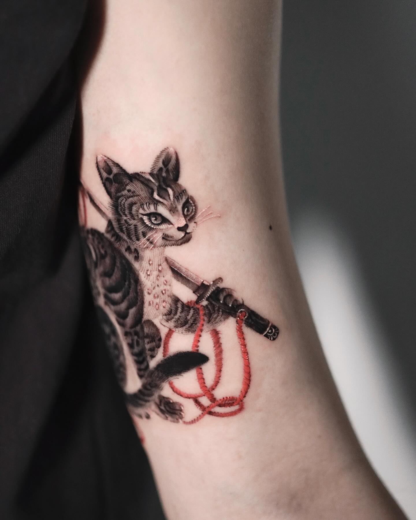 Cat with sword dotwork tattoo on the forearm by 𝐆𝐑𝐄𝐄𝐃