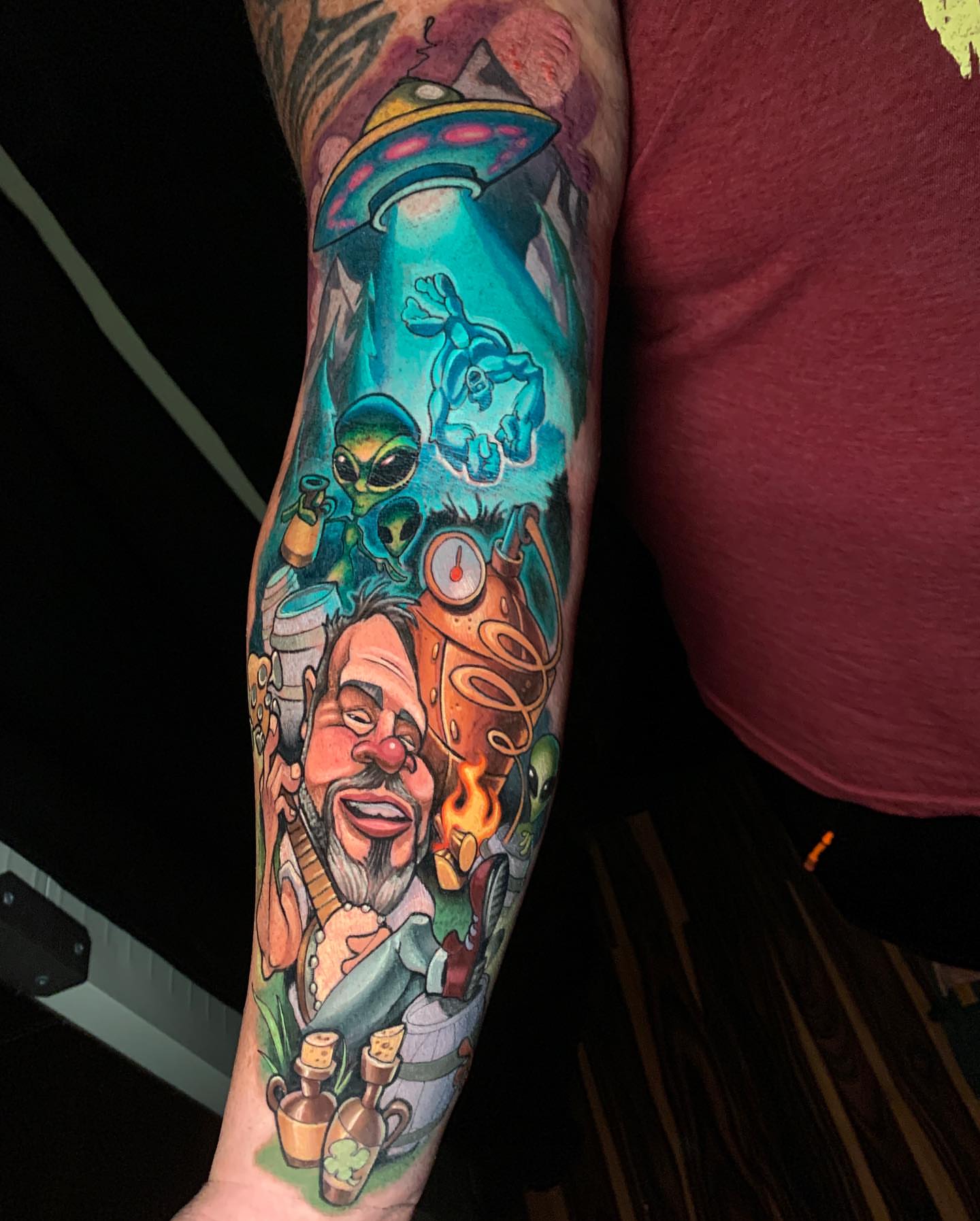 Aliens and space theme new school tattoo on the forearm by Joshua L Wilson, Dayton, Ohio
