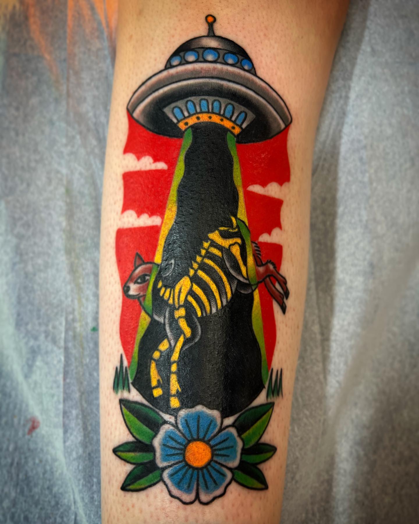 Alien abduction American traditional tattoo on the forearm by Dustin Hysell