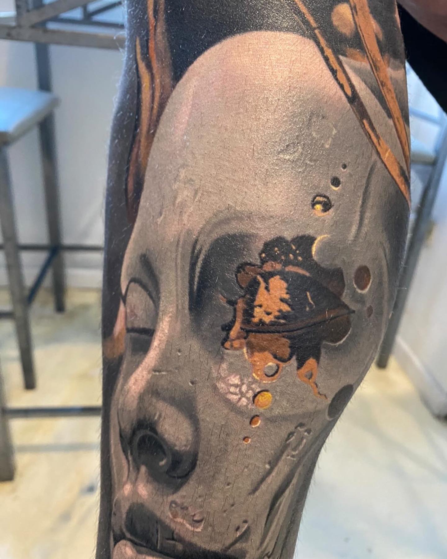 Abstract face dotwork tattoo on the forearm by Jacob Sheffield, Grand Junction, Colorado