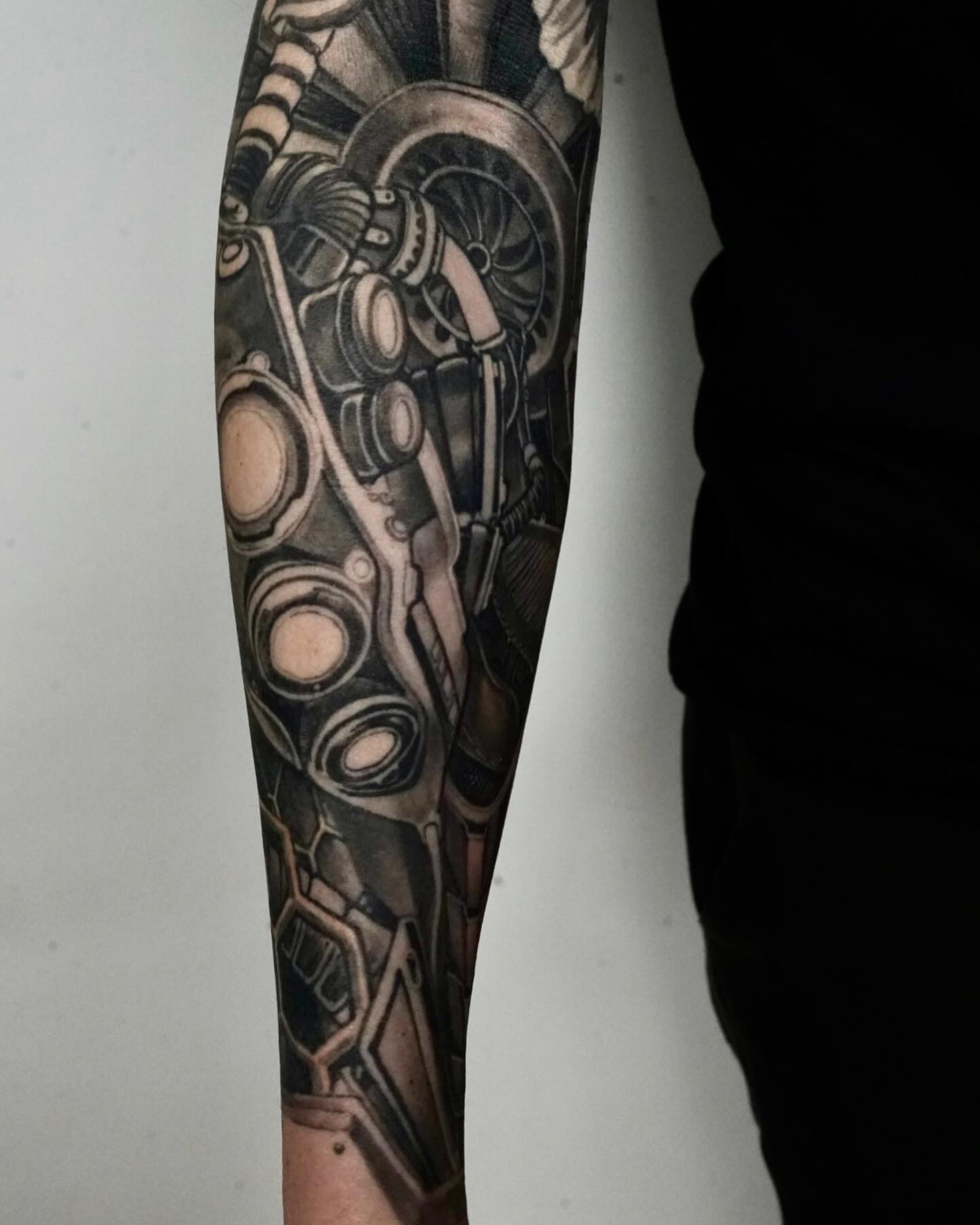 Mechanical gears geometric tattoo on the forearm by Vinny Holistic Ink