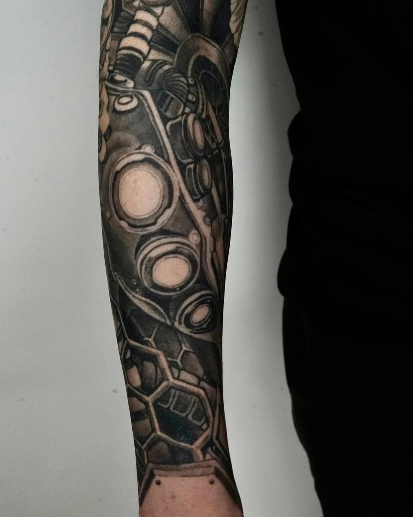 Mechanical gear geometric tattoo on the forearm by Vinny Holistic Ink