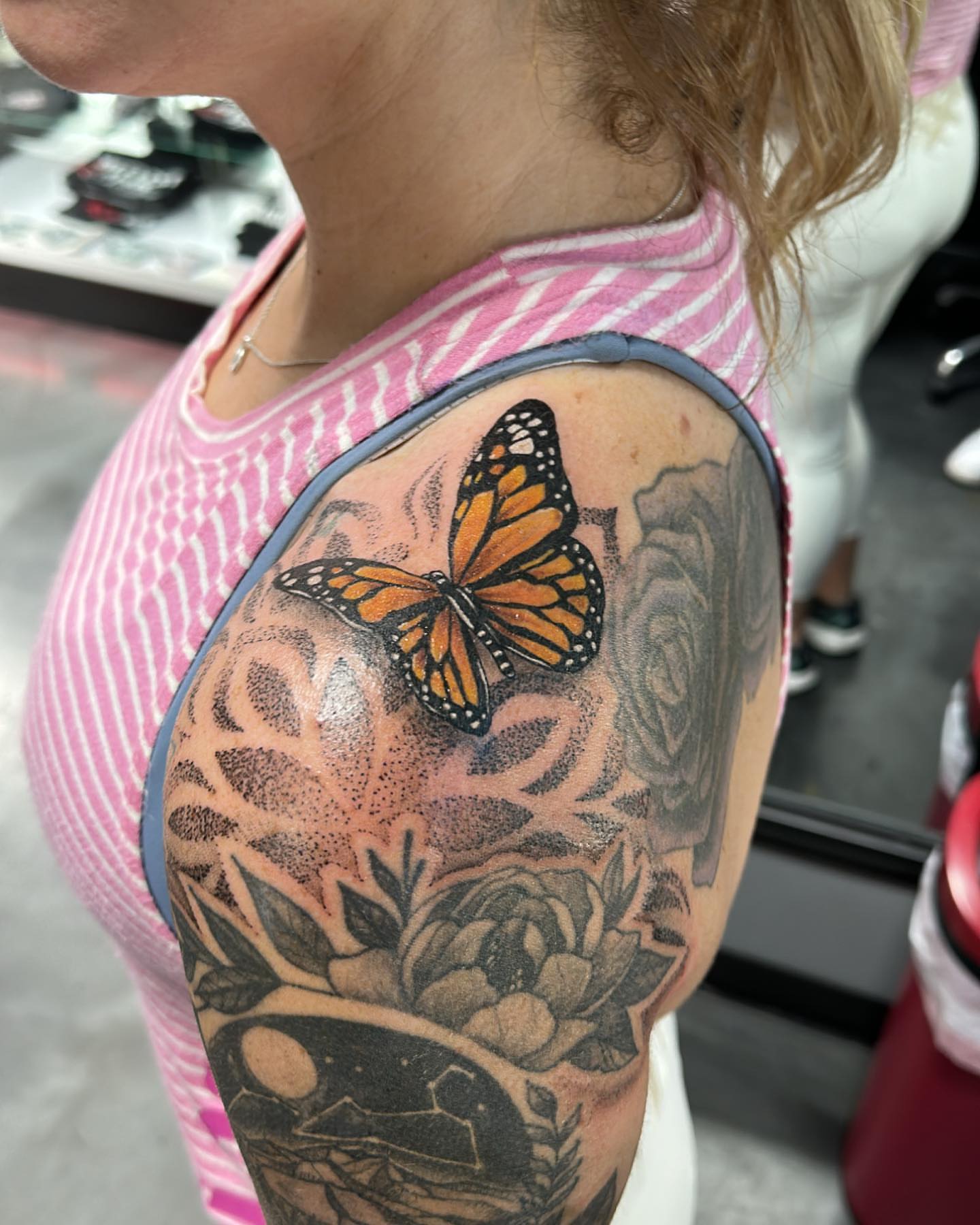 Monarch butterfly dotwork tattoo on the shoulder by Pablo Venegas