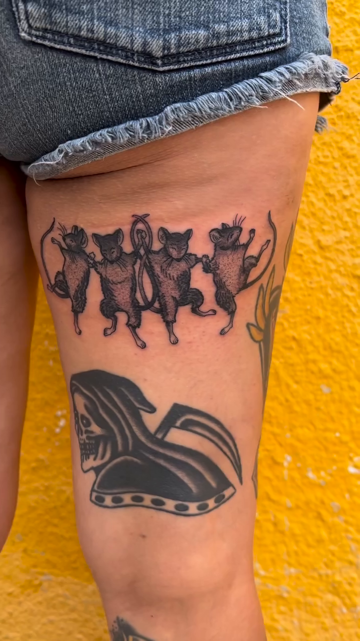 Dancing figures and a grim reaper blackwork tattoo by Daniel Patrick