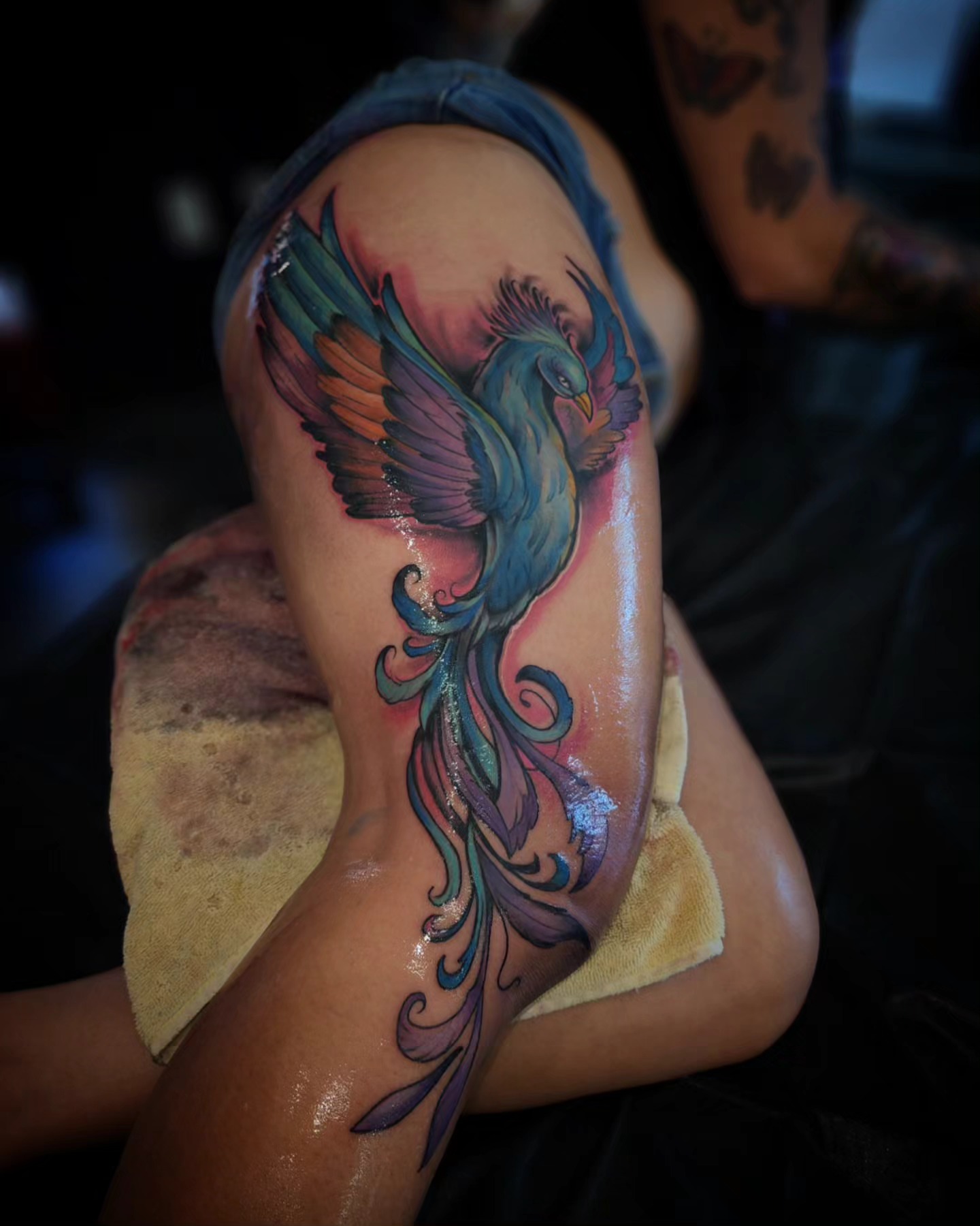 Bird new school tattoo on the upper arm by Drew Siciliano, Glendale, Arizona