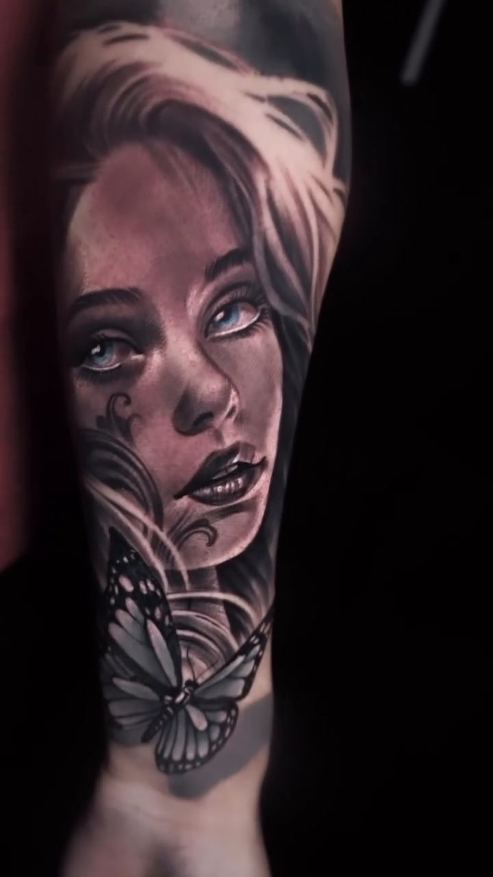 Woman and butterfly realism tattoo by Tattoos By Chino