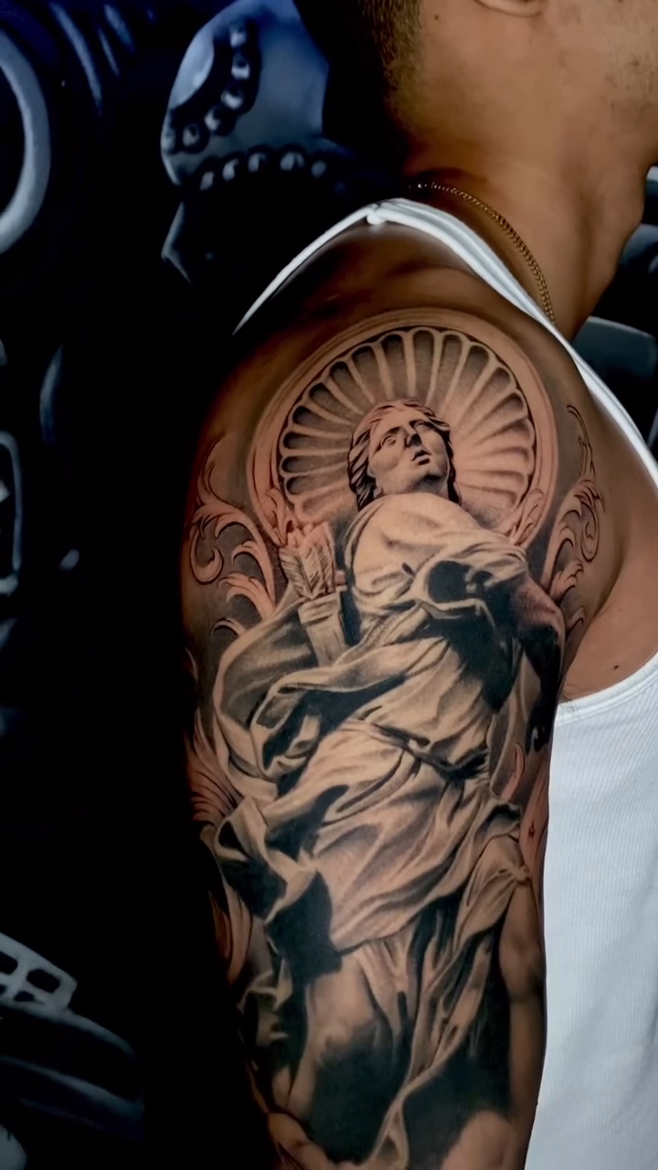 Religious scene with angel and doves realism tattoo by Las Vegas tattoo Artist