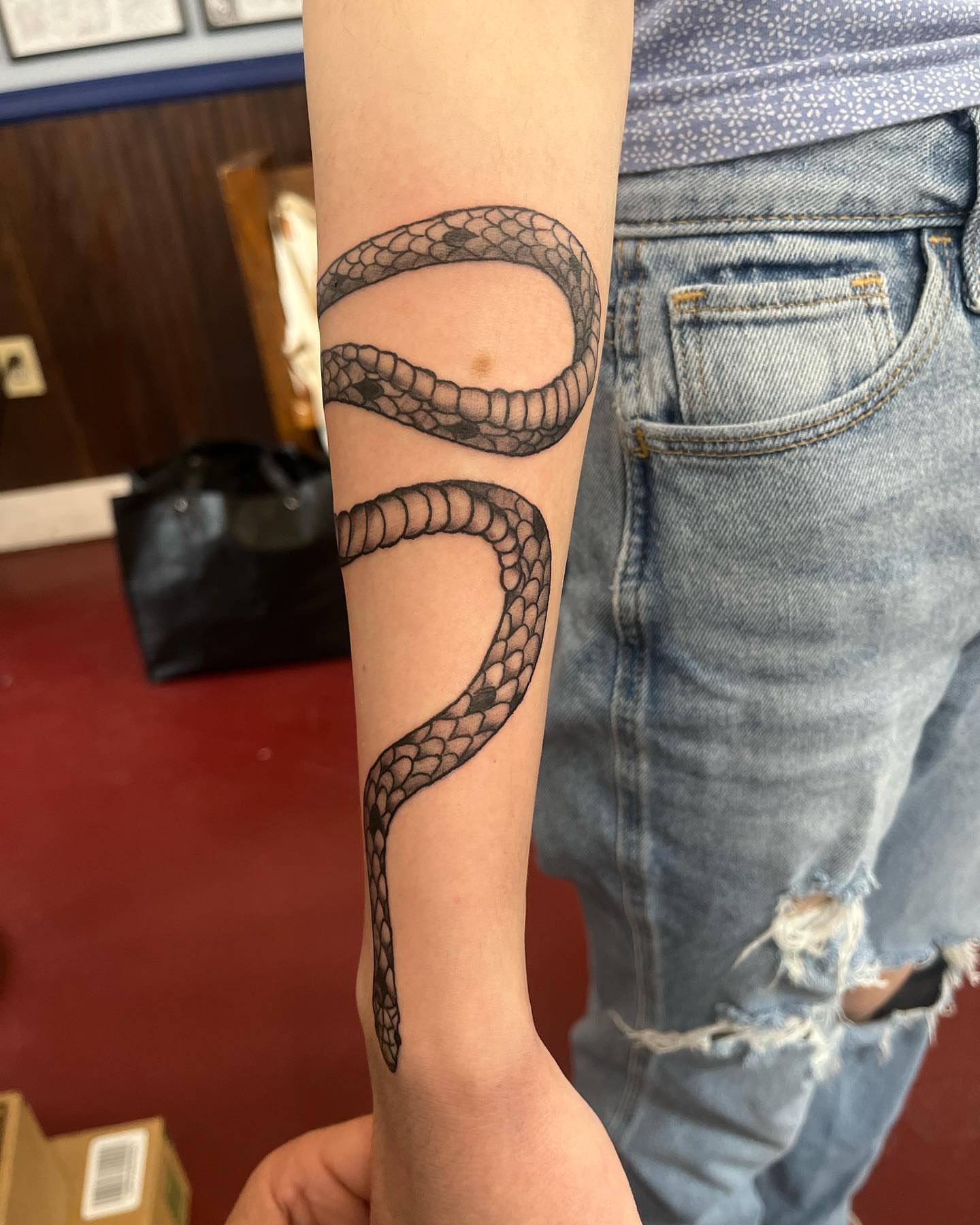 Snake black and grey tattoo on the forearm by IdleHandsFlex, New Orleans, Louisiana