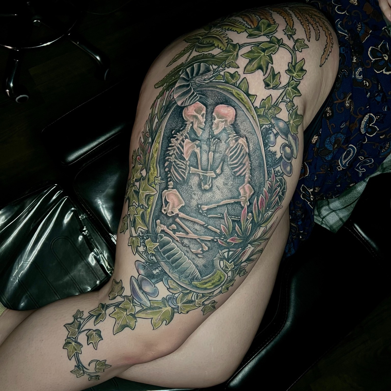 Skeleton in ivy realism tattoo on the thigh by Em ✨PA Tattooer