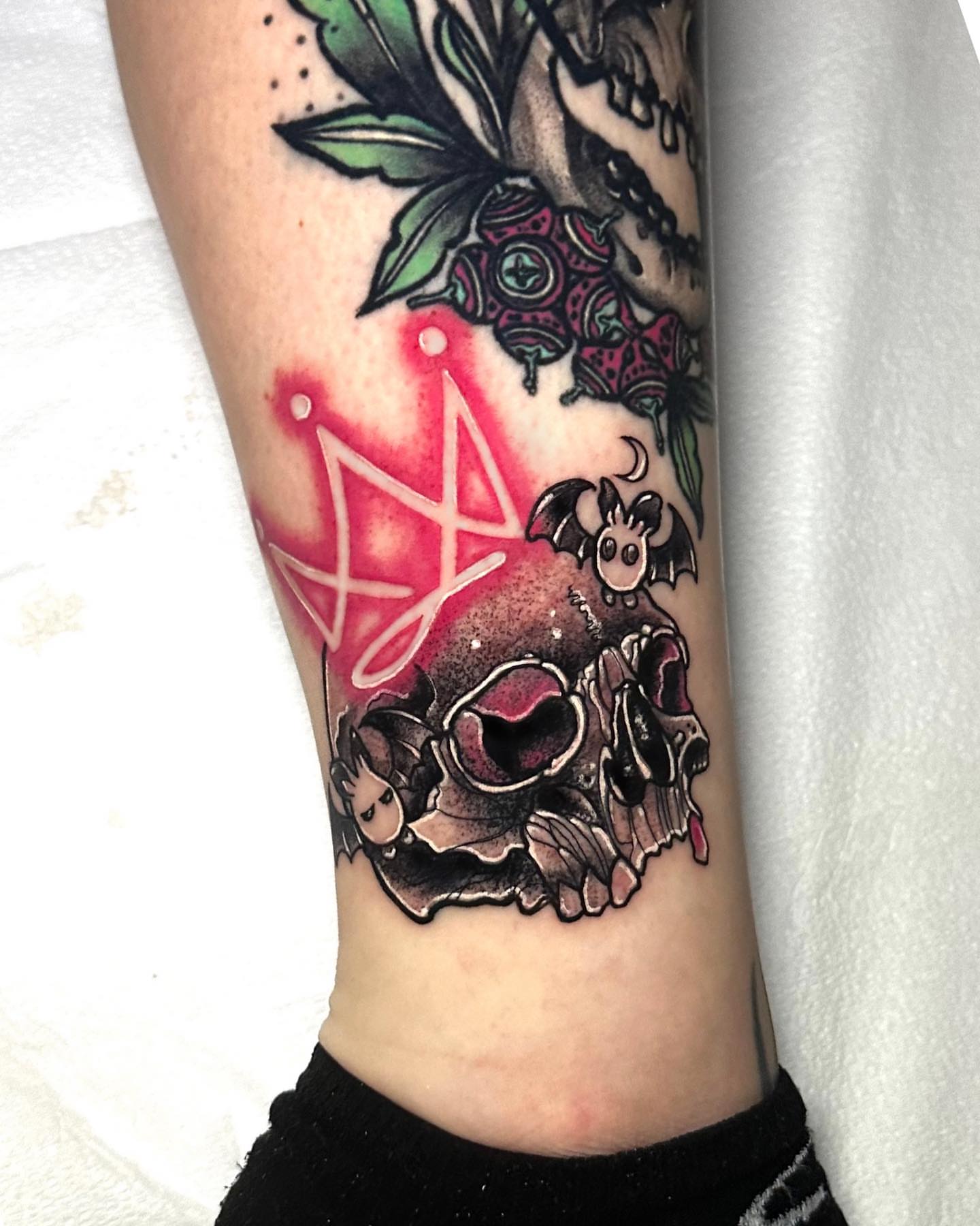 Pentagram and skull neo-traditional tattoo on the forearm by Naysla Droguett