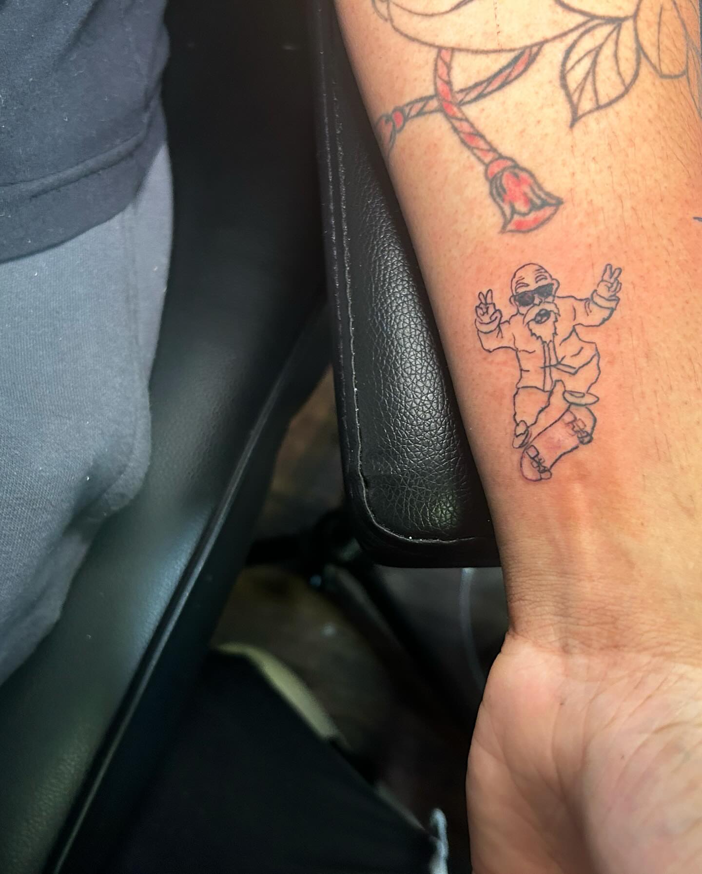 Santa Claus new school tattoo on the forearm by Anthony Washington, Atlanta, Georgia