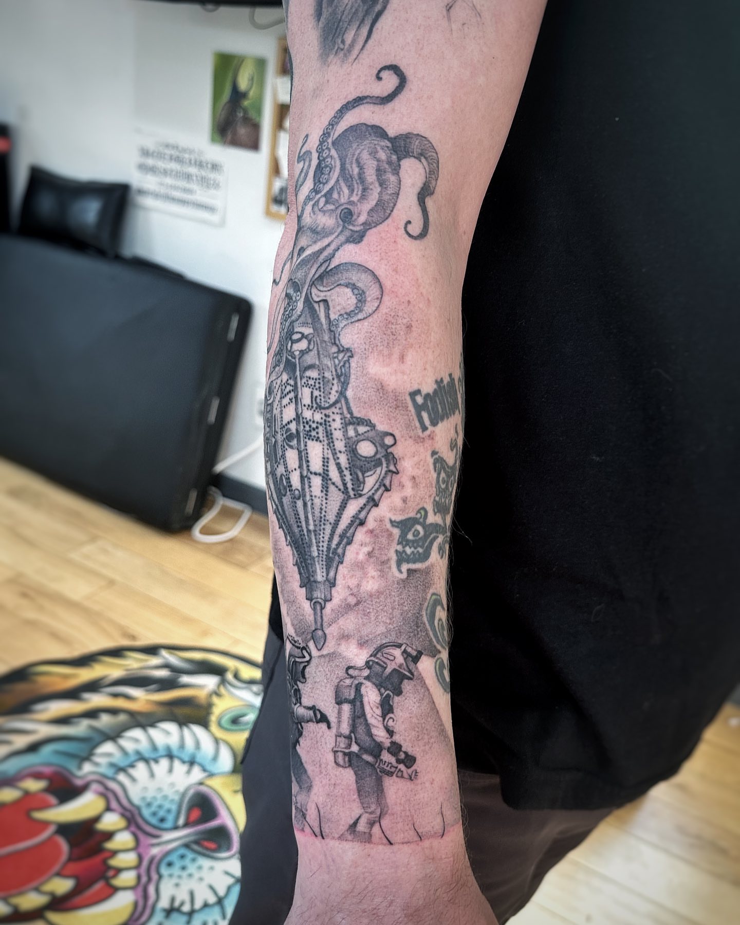 Steampunk airship geometric tattoo on the forearm by David Gray