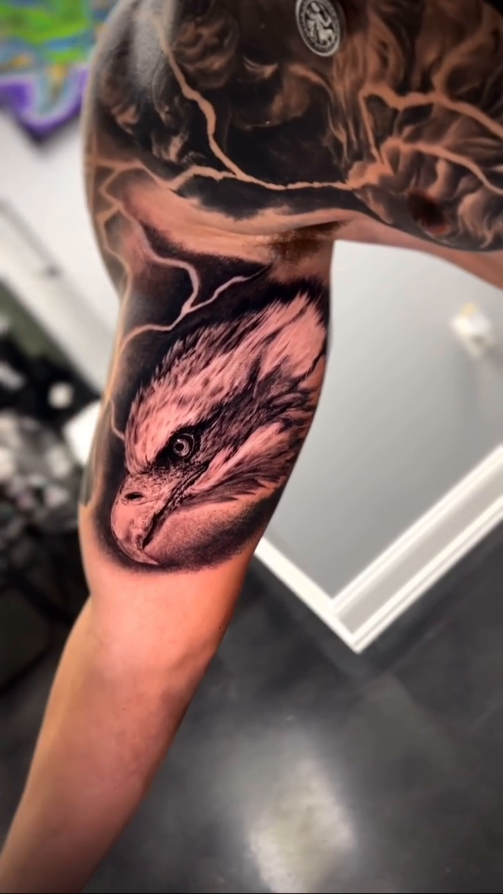 Eagle head realism tattoo by Matthew Diaz