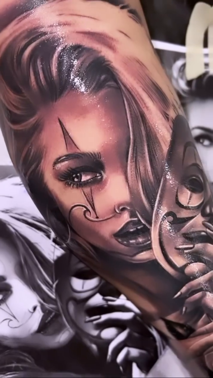 Woman with masks and rose realism tattoo by Tattoo