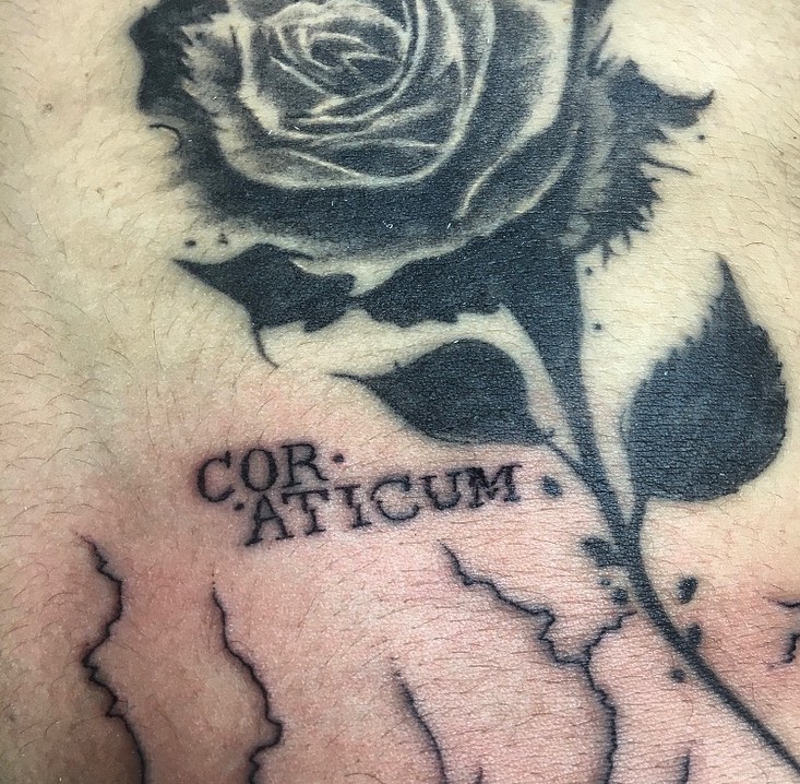 Rose black and grey tattoo on the chest by la flamme