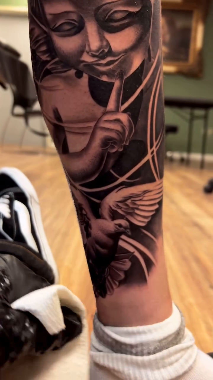 Angelic face and dove realism tattoo by ⚠️new Account⚠️